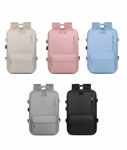 Travel backpack shown in cream, pink, blue, grey, and black color options with USB port