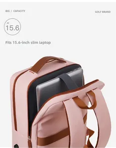 Detail view of pink laptop backpack showing dedicated compartment for 15.6 inch computer
