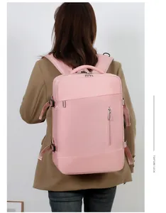 Sac à dos voyage rose grande capacité avec poignée supérieure large et sangles de côté