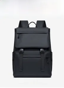 Detailed front view of black waterproof backpack with flap closure and buckle straps
