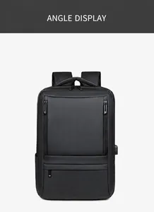 Front view of black waterproof laptop backpack with multiple zippers and USB charging port
