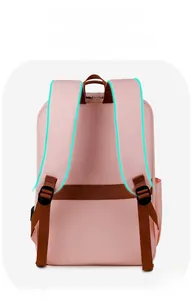Rear view of pink laptop backpack featuring thick brown padded shoulder straps and top handle