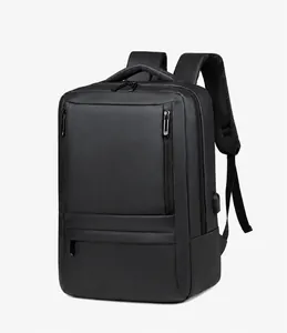 Detail of waterproof business backpack showing USB charging port and multi-layer zippers
