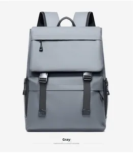 Front view of grey large-capacity travel backpack with durable straps and front zipper pocket