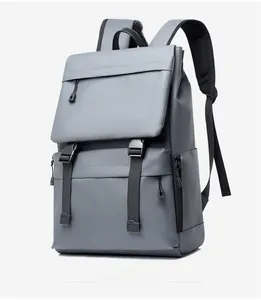 Detail of grey waterproof laptop backpack with security buckles and leather handle