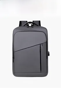 Front view of a deep grey business backpack with waterproof nylon and external USB port