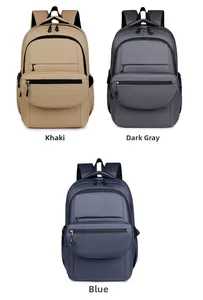 Detailed view of the large capacity backpack in khaki, dark gray, and blue colors