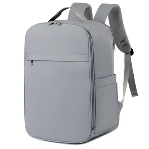 Grey business commuter laptop backpack with minimalist design and adjustable straps