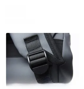 Detail view of durable black plastic adjustment buckle on high-density nylon shoulder strap