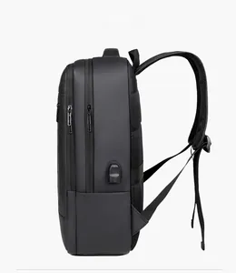 Side view of black business backpack showing external USB port and ergonomic mesh padding