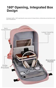 Detail view of pink backpack with 180 degree opening and organized storage pockets