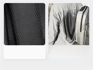 Breathable honeycomb mesh back panel detail on grey backpack for superior air circulation