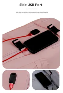 Pink travel backpack detail featuring a side USB charging port for smartphones