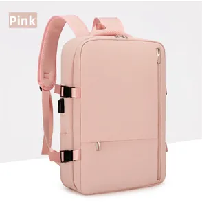 Pink travel backpack detail featuring a side USB charging port and adjustable buckle