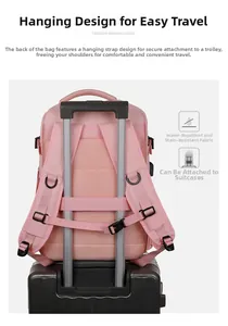 Pink travel backpack showing waterproof fabric and a luggage strap for easy attachment
