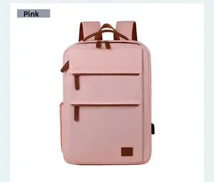 Pink waterproof nylon laptop backpack featuring dual front zippers and brown leather handles