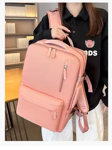 Pink large-capacity travel backpack featuring breathable mesh shoulder straps and ergonomic design