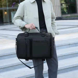 Versatile black travel duffel bag with multiple pockets and adjustable shoulder strap