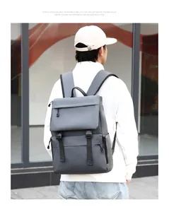 Outdoor model shot of gray backpack with adjustable buckles and side pocket design