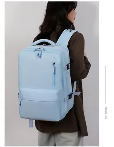 Side view of a large light blue travel backpack with adjustable side compression straps