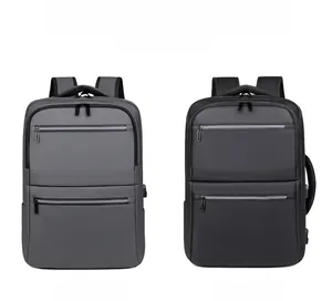 Business laptop backpack shown in black and gray options with built-in USB charging port