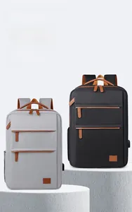 Detail of gray and black business backpacks with waterproof fabric and USB charging port