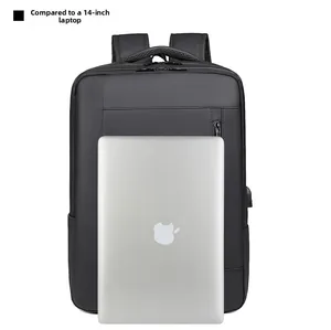 Waterproof black business backpack shown with 14-inch laptop and USB charging port