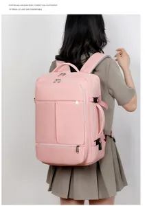 Pink large-capacity laptop backpack with multiple zipper layers and side handle detail