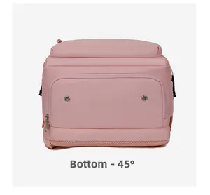 Detail view of pink travel backpack bottom with metal air vents and breathable mesh