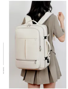 Detail view of large cream travel laptop backpack featuring side buckle and multi-pockets