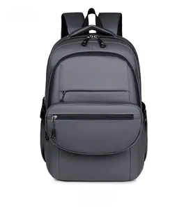 Front view of a dark grey waterproof nylon backpack with multiple zipper pockets