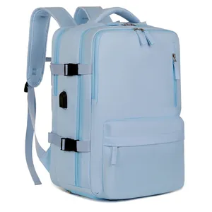 Light blue large capacity travel backpack with USB port and adjustable compression straps