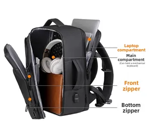 Detail of multi-compartment travel backpack showing laptop and keyboard storage