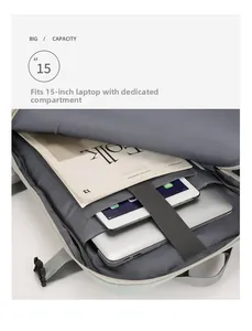 Detail view of the multi-layer storage with 15-inch laptop compartment and elastic strap