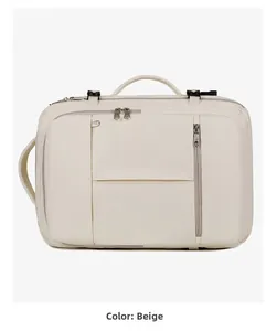 Close-up of cream white business backpack showing top handle and reinforced buckles