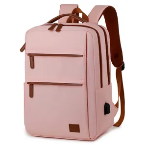 Pink waterproof laptop backpack with USB port and brown handles for travel and business