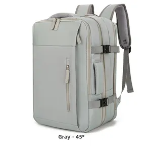 Detail view of grey travel backpack showing water-resistant fabric and side handle