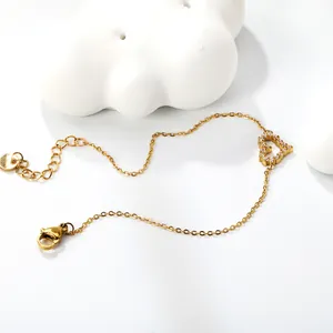 Minimalist gold heart charm bracelet with sparkling zircons and delicate link chain