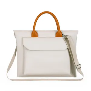 Large business briefcase in cream white leather with brown handles and a laptop compartment