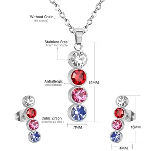 Detail of stainless steel jewelry set featuring colorful cubic zirconia drop earrings and pendant