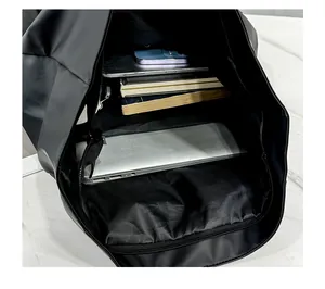 Detailed view of spacious interior with laptop and tablet compartments in black backpack