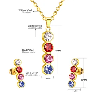 Detail view of gold-plated stainless steel jewelry set with colorful cubic zirconia