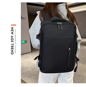 Rear view of black multi-compartment travel laptop backpack with side compression buckles