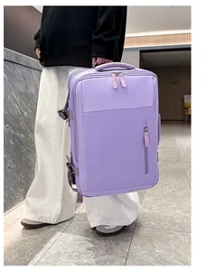 Detail view of purple travel backpack featuring side compression straps and sturdy zippers