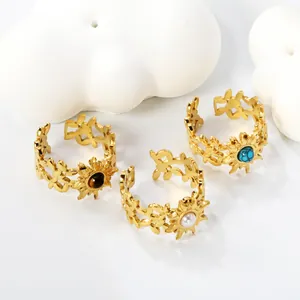 Three-piece gold stainless steel ring set with turquoise, pearl and tiger eye stones
