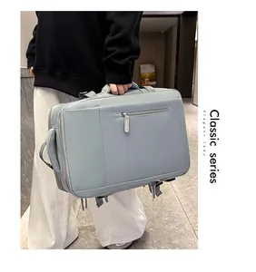 Modern light blue travel backpack with multi-layer storage and comfortable hand grip