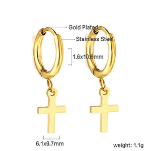 Detail of gold plated stainless steel hoop earrings with small cross charms