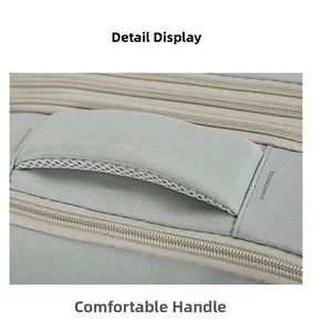 Detail of the reinforced padded handle with breathable mesh on the blue travel backpack