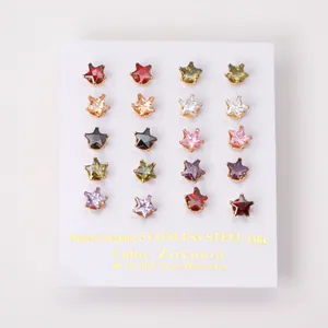 Macro view of 316L stainless steel star earrings set with colorful cubic zirconia