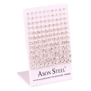 Detail view of hypoallergenic stainless steel stud earrings with round cubic zirconia